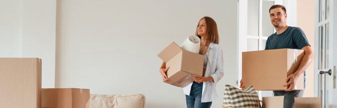 Young couple moving into new home