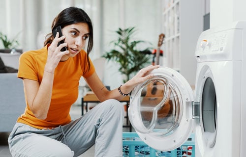 Woman using phone to submit a claim